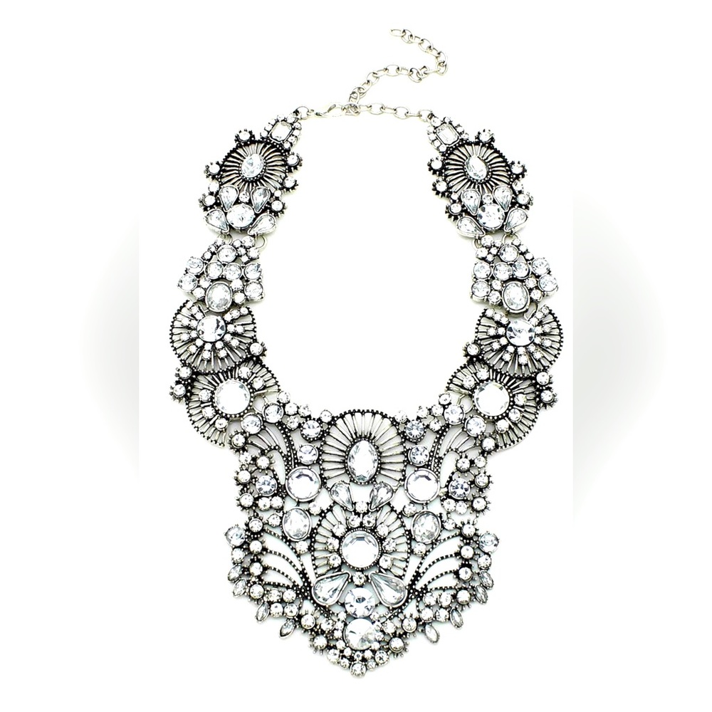 Silver-tone collar bib statement necklace
Approx. 12" length & 3" extension